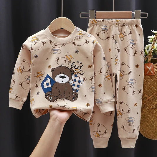 Pyjama Ourson pour Bébé/Enfant beige avec ourson marron au centre et plusieurs motifs de petit ourson sur tout le pyjama