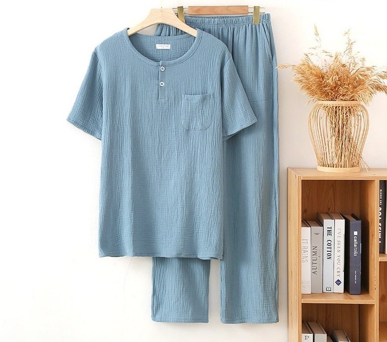 ensemble pyjama uni pour homme sur fond blanc de couleur bleu